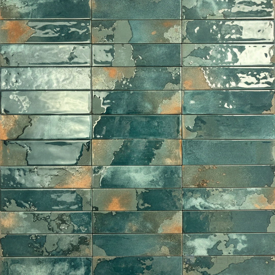 Rich emerald tones and a glossy finish give this 2.5x9 porcelain tile a bold and elegant look.