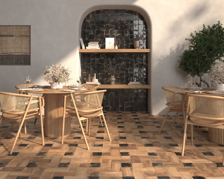 Black glossy square tiles in an industrial-style powder room.