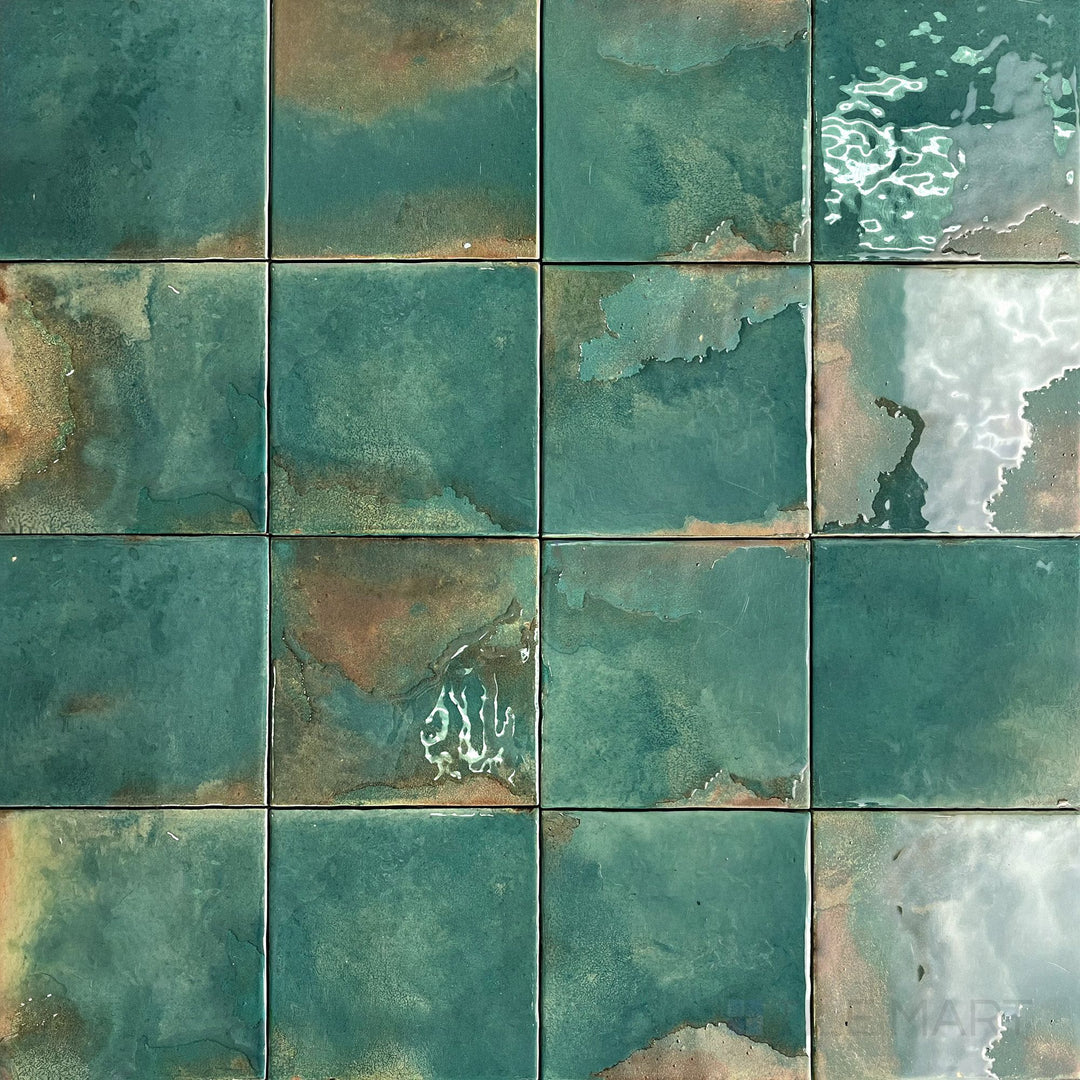 Lush emerald green coloring and a high-gloss finish define this 4.5x4.5 porcelain tile's vibrant appearance.