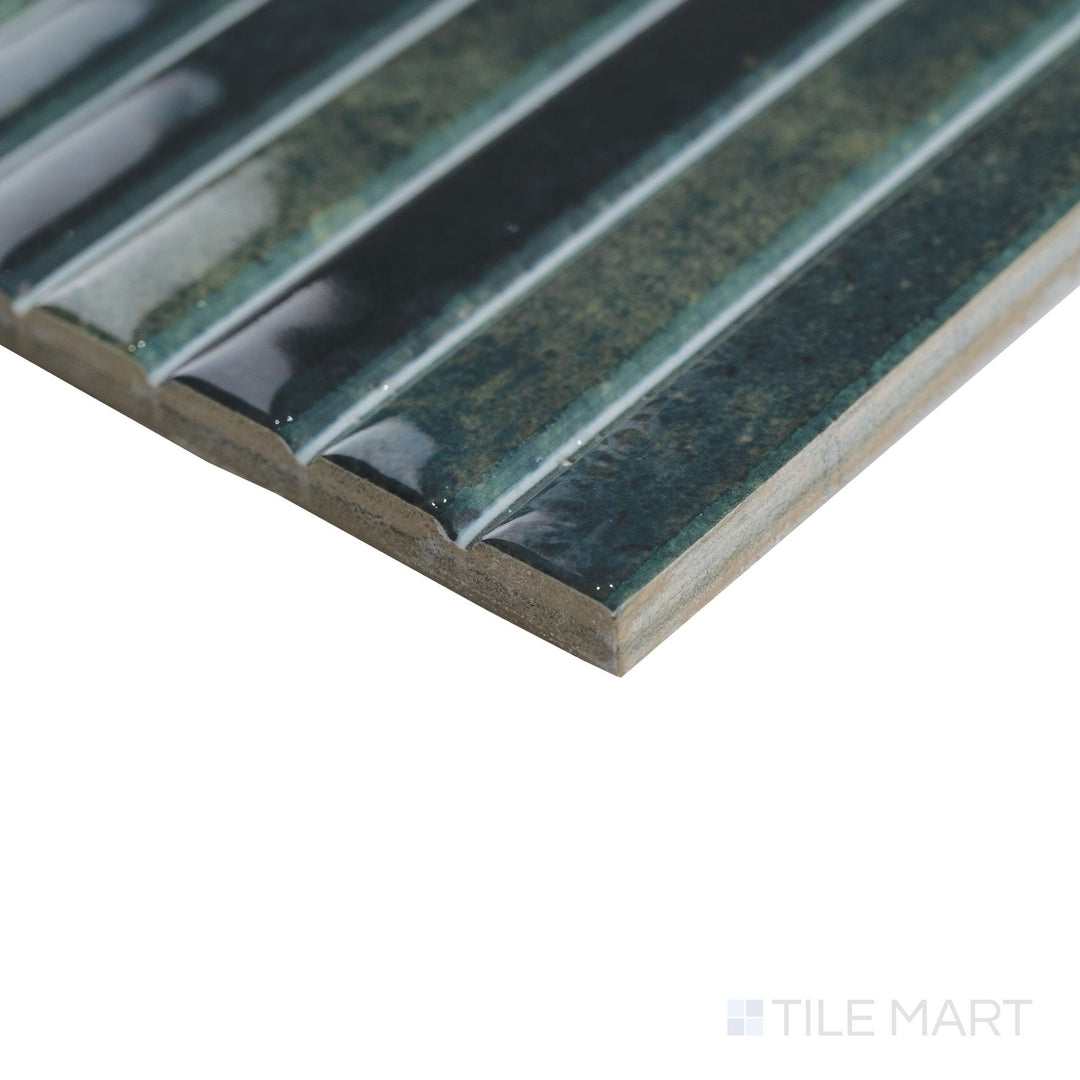 Corner shot of Kit Kat Grass mosaic showing narrow green sticks with a high-gloss finish and defined edge alignment.