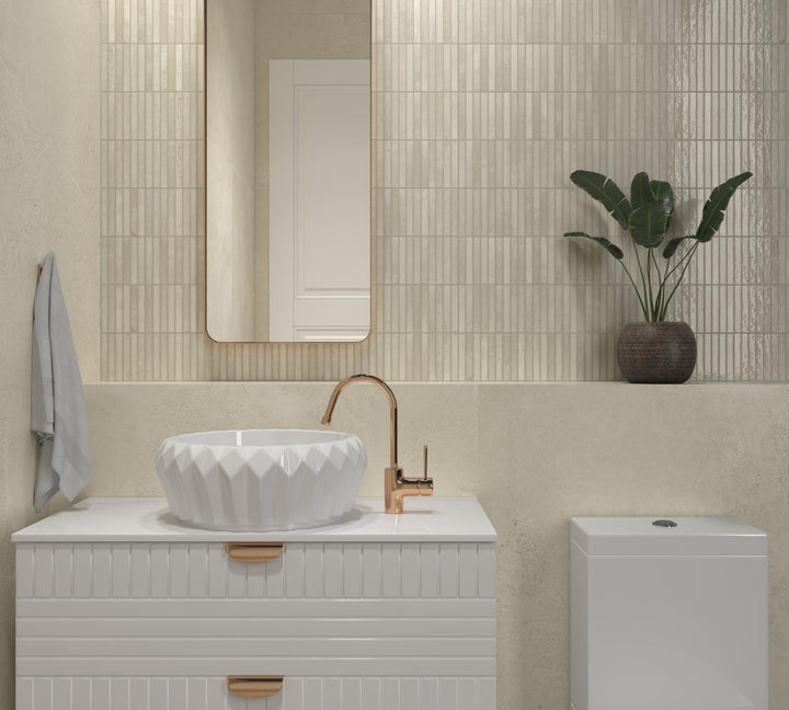 Ivory porcelain mosaic tile in a Kit Kat format with a glossy surface, ideal for clean and neutral interior design themes.