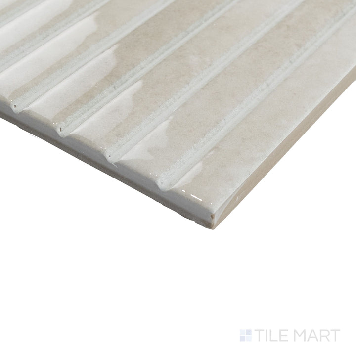 Angled corner view of Kit Kat Ivory mosaic featuring glossy off-white tiles with clean, stacked edges.