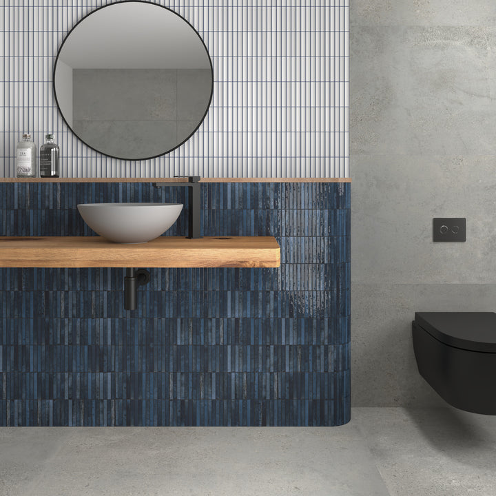 Ocean-toned Kit Kat porcelain mosaic tile with a glossy finish, providing cool blue accents and visual depth to any space.