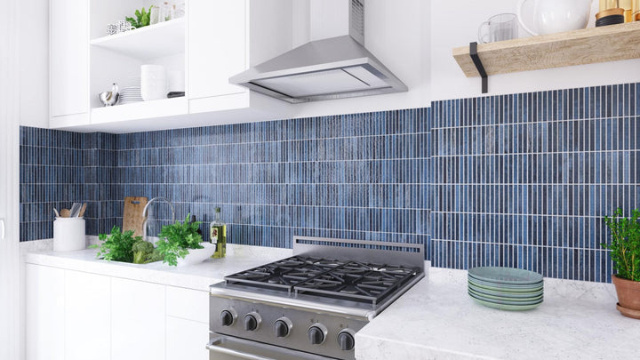 Glossy Ocean porcelain tile in a mosaic layout, blending rich blue tones with sleek lines for stylish wall décor.