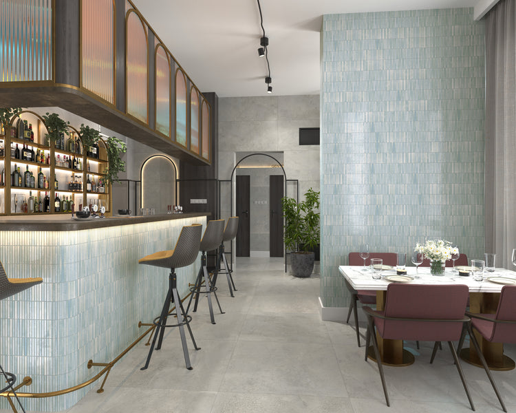 Kit Kat Water porcelain mosaic tile with a glossy aqua tone, bringing a fresh and fluid look to modern design spaces.