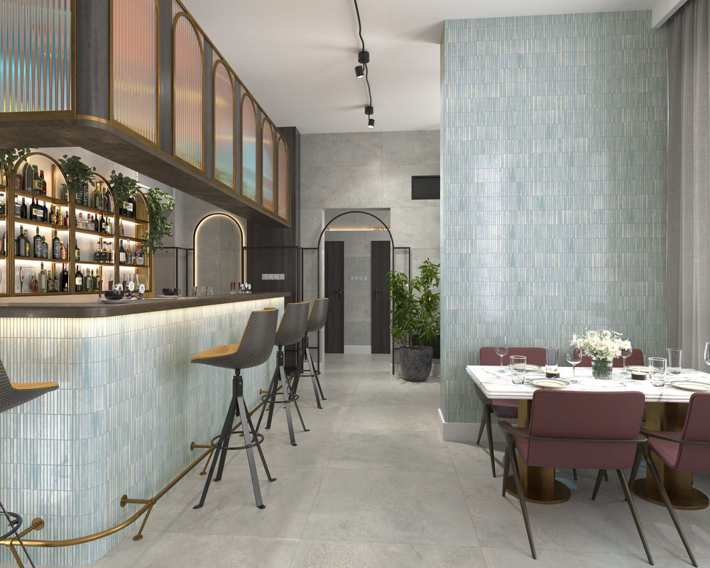 Kit Kat Water porcelain mosaic tile with a glossy aqua tone, bringing a fresh and fluid look to modern design spaces.