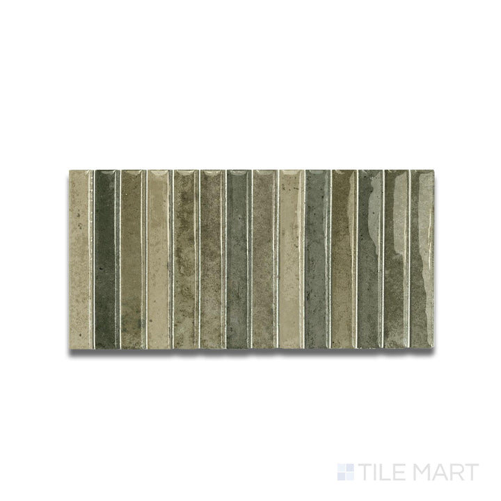 Flat lay view capturing the earthy green gloss and repeating strip layout of the Kit Kat Musgo mosaic.