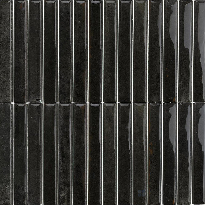 Dark, moody tones and a reflective finish make this Kit Kat Noche porcelain mosaic bold and sophisticated.