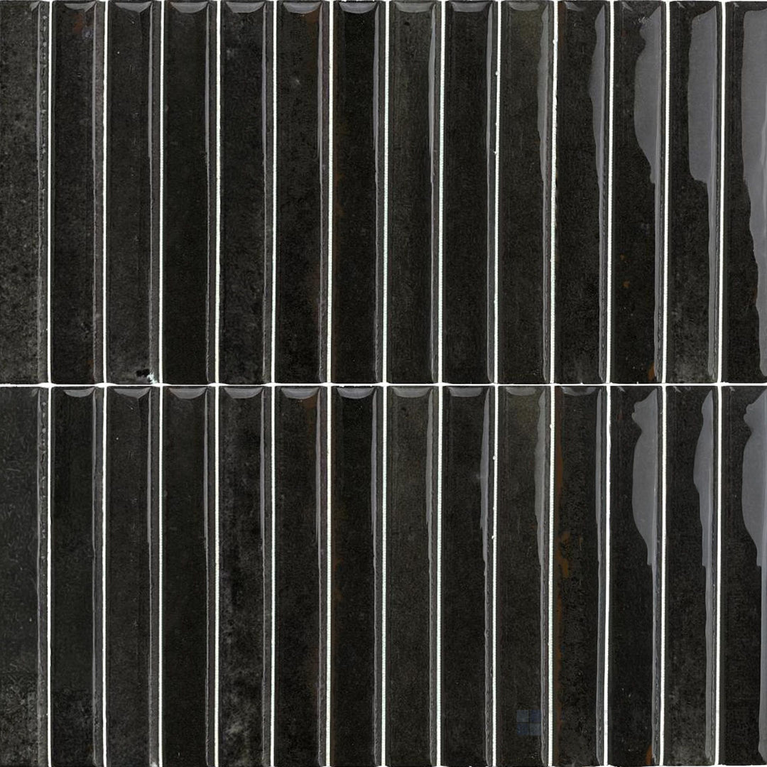 Dark, moody tones and a reflective finish make this Kit Kat Noche porcelain mosaic bold and sophisticated.