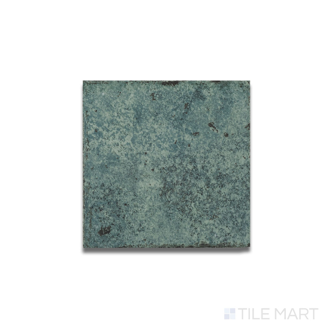 Top-down view of Tahiti Emerald matte porcelain tile featuring a textured R11 surface and rich green tone in 6x6 format.