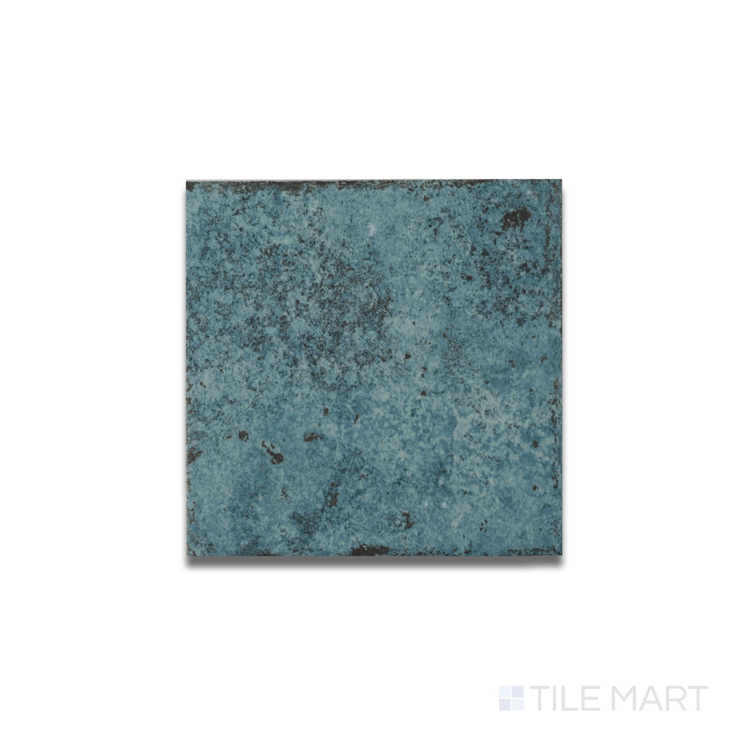 Overhead image showing the bold turquoise color and matte R11 finish of the Tahiti Turquoise 6x6 porcelain tile.