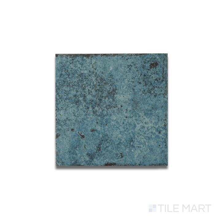 Overhead image showing the bold turquoise color and matte R11 finish of the Tahiti Turquoise 6x6 porcelain tile.