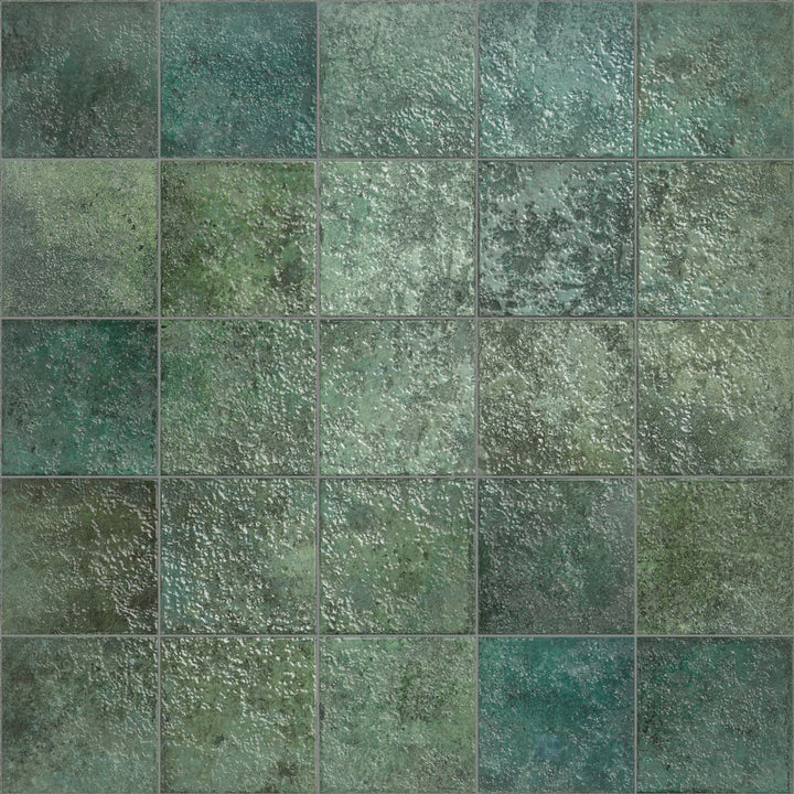 A glossy emerald green glaze gives this 6x6 porcelain tile a radiant, jewel-toned finish.
