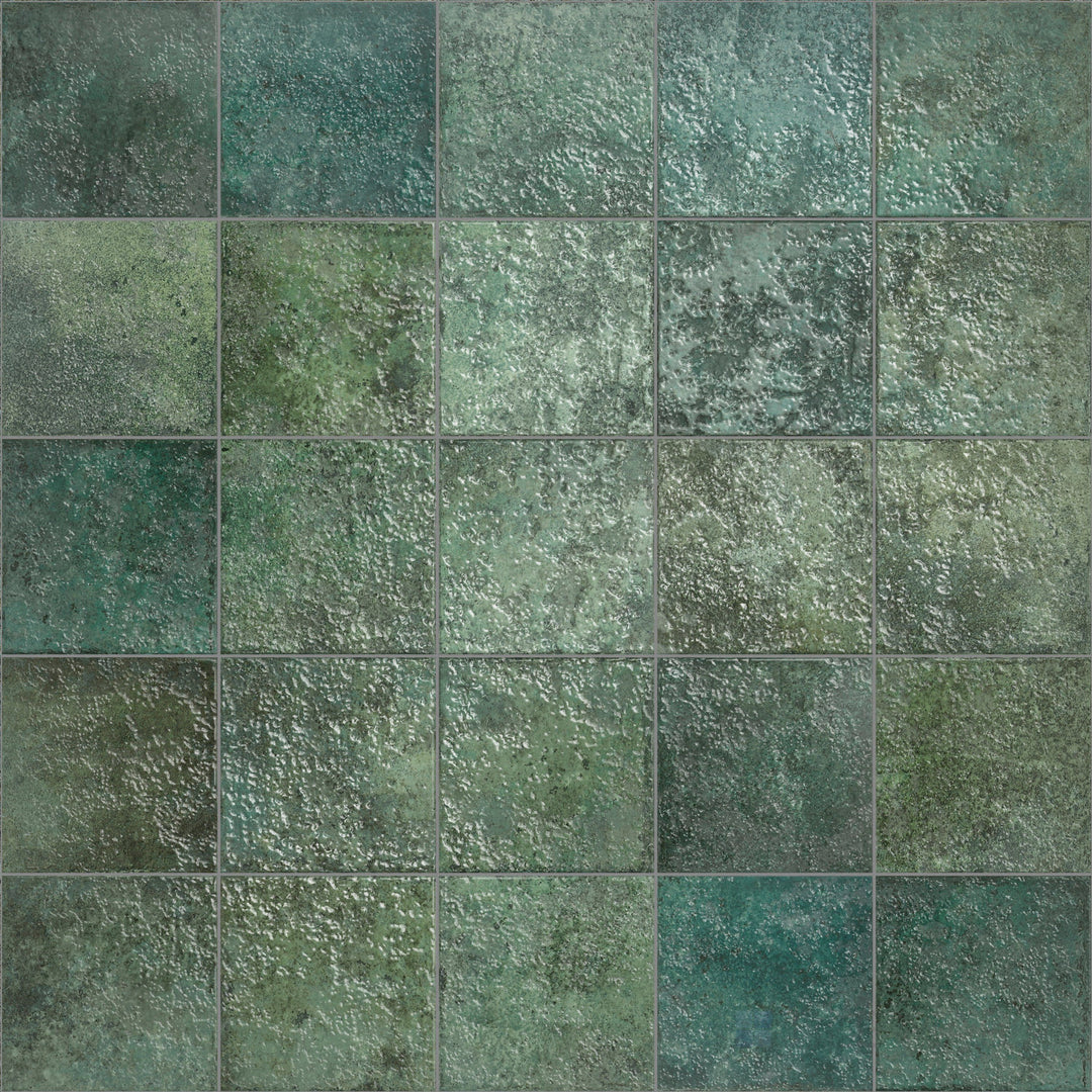 A glossy emerald green glaze gives this 6x6 porcelain tile a radiant, jewel-toned finish.