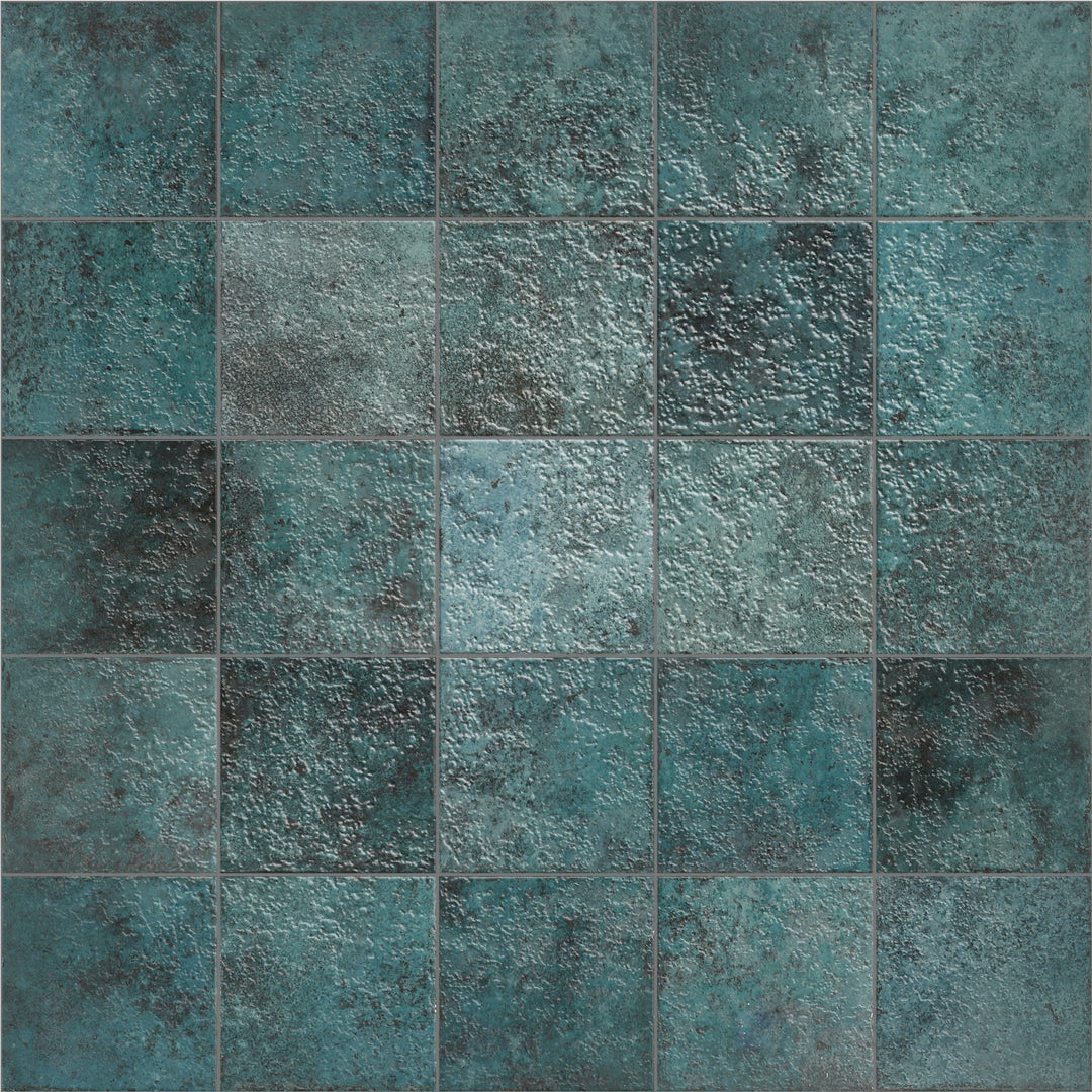 Bright turquoise coloring and a glossy sheen bring this 6x6 porcelain tile to life with vivid clarity.