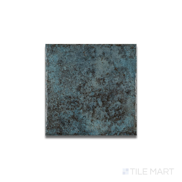 Aerial view of Tahiti Turquoise glossy tile highlighting its smooth glaze and vivid blue-green coloration in 6x6 size.