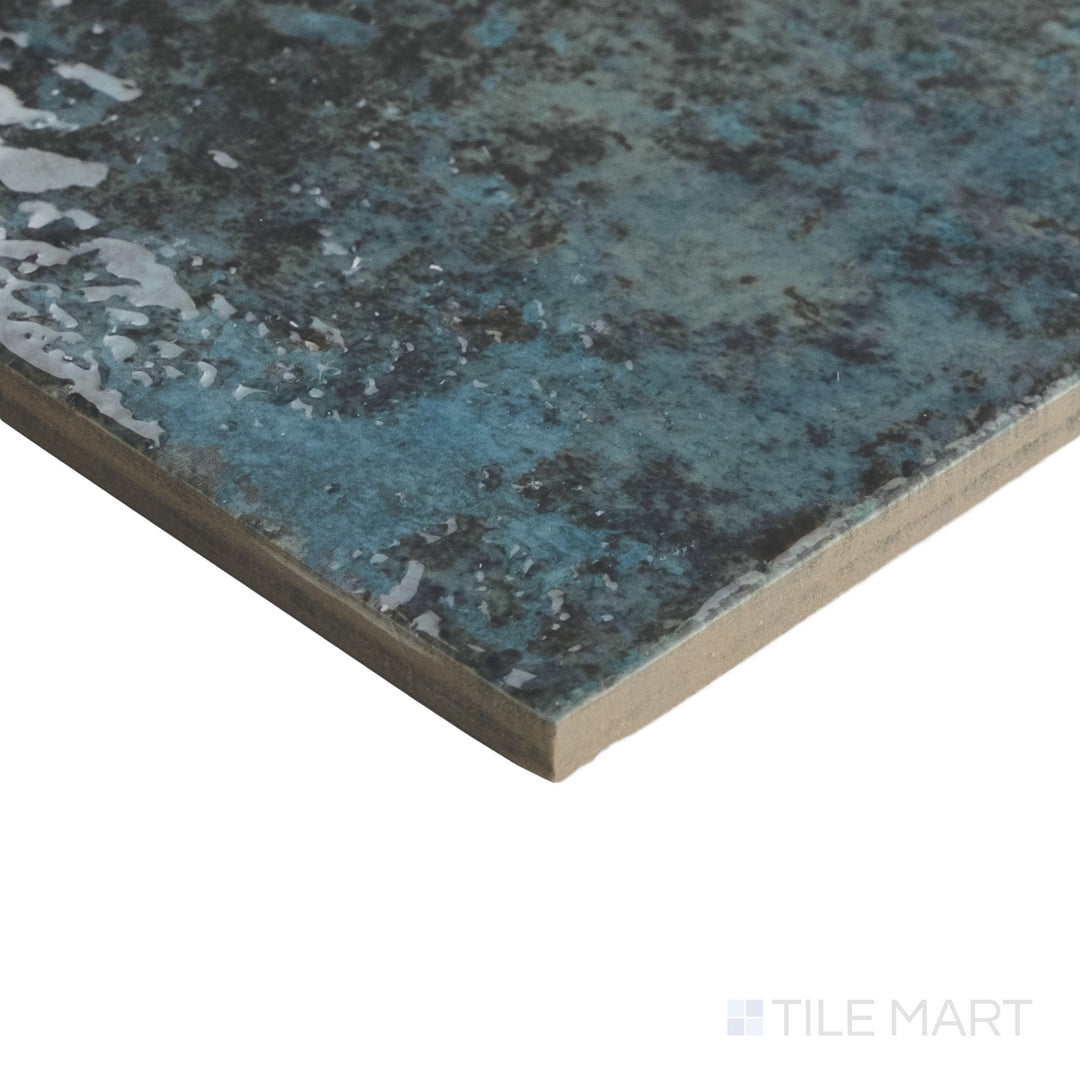 Close-up corner view of Tahiti Turquoise 6x6 glossy tile with a bright glaze and crisp edge finish.