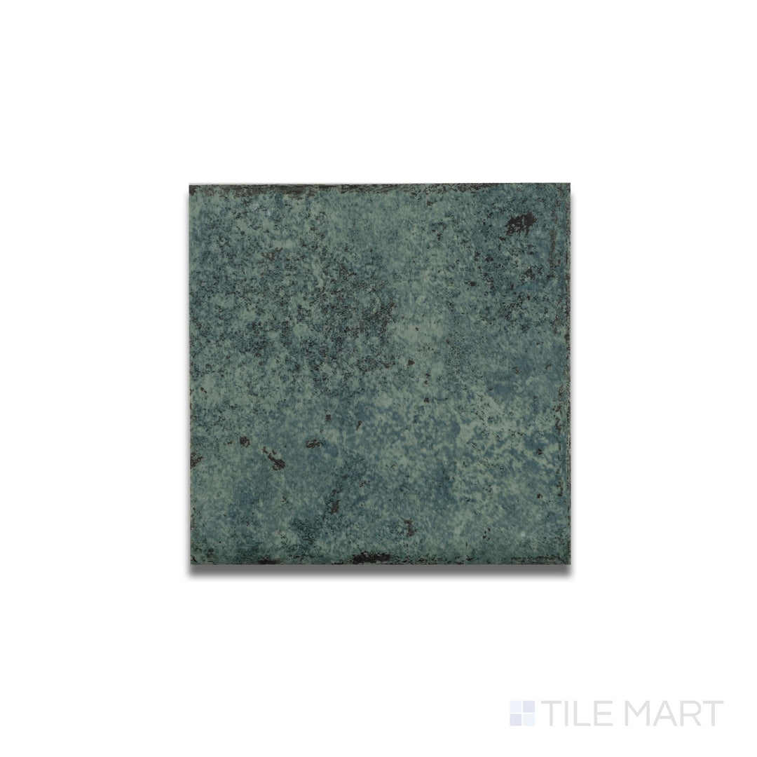 Top-down perspective of the Tahiti Emerald R11 bullnose tile, showing the matte green finish and rounded edge detail.