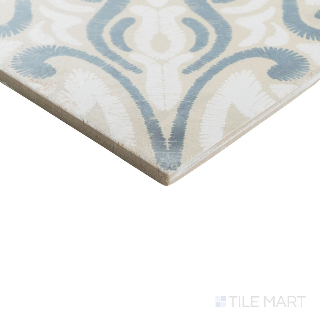 Angled view of Atlantique Josselin 8x8 matte tile with subtle vintage pattern wrapping around a defined tile corner.