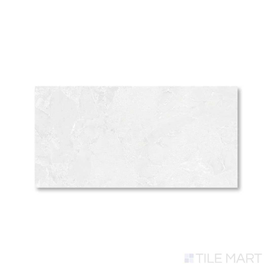 Overhead view of Avalon Blanco 12x24 porcelain tile showcasing its soft white tone and smooth matte texture.