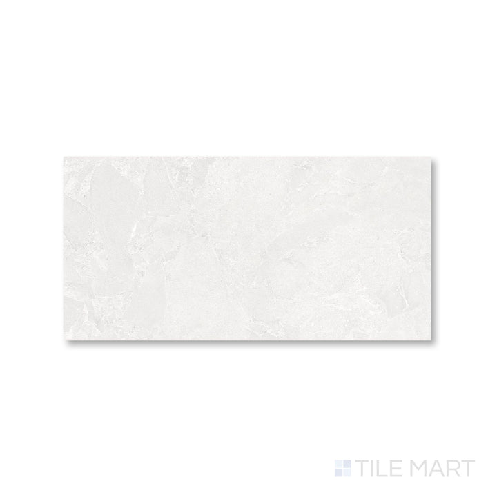 Overhead view of Avalon Blanco 12x24 porcelain tile showcasing its soft white tone and smooth matte texture.