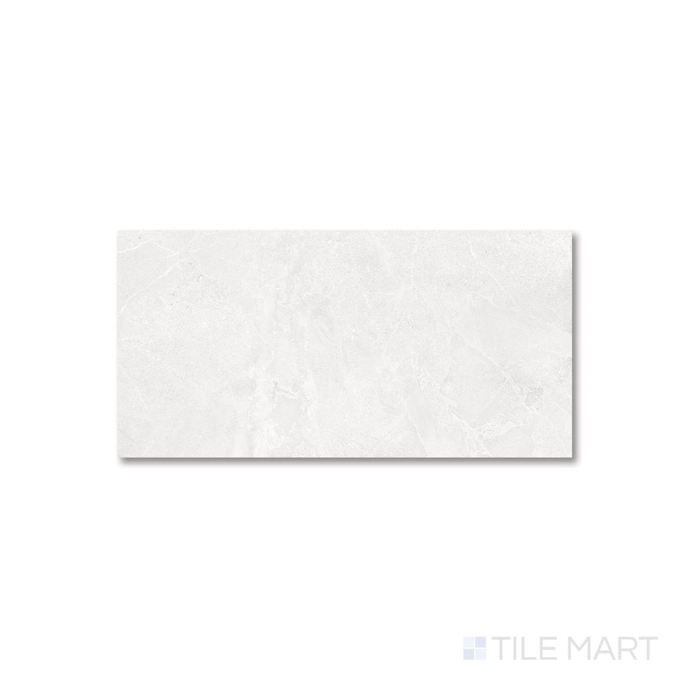 Top-down layout of Avalon Blanco 24x48 porcelain tile emphasizing its expansive matte surface and light coloration.