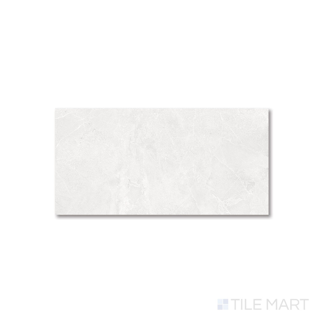 Top-down layout of Avalon Blanco 24x48 porcelain tile emphasizing its expansive matte surface and light coloration.