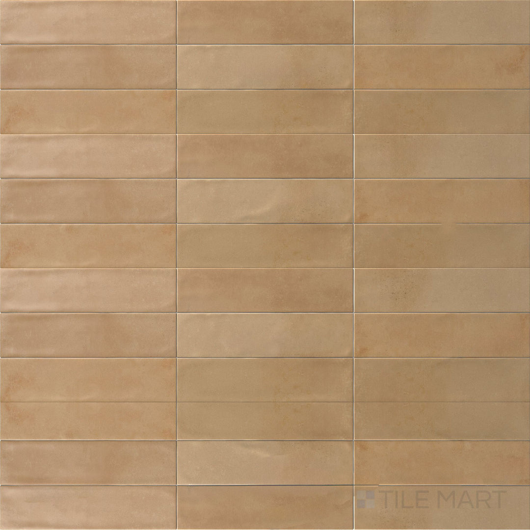 Earthy terracotta tones and a soft matte finish come together in this 3x11 Agadir Cotto Oscuro porcelain tile.