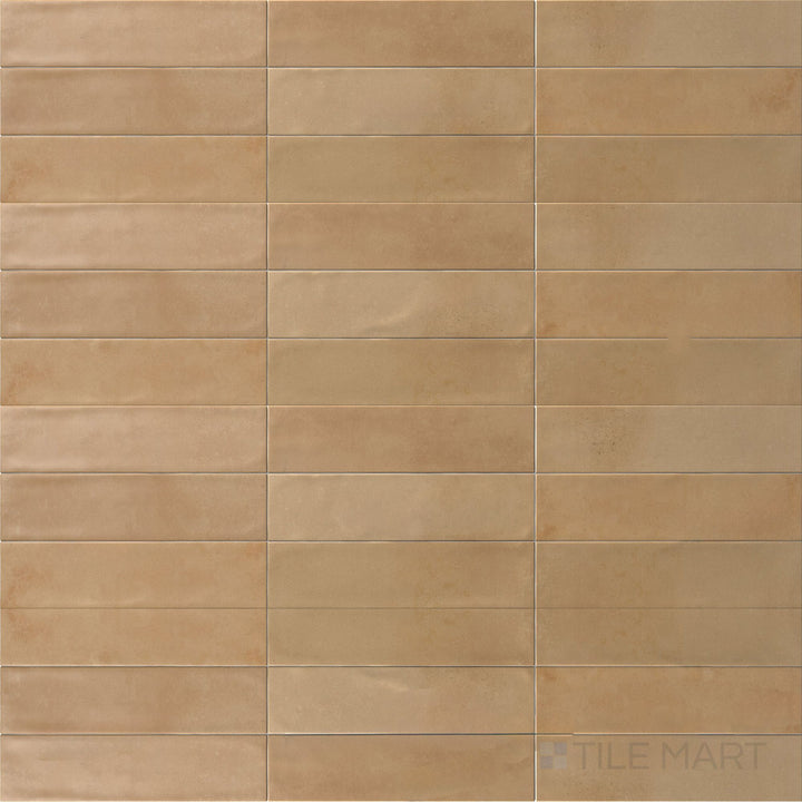 Earthy terracotta tones and a soft matte finish come together in this 3x11 Agadir Cotto Oscuro porcelain tile.