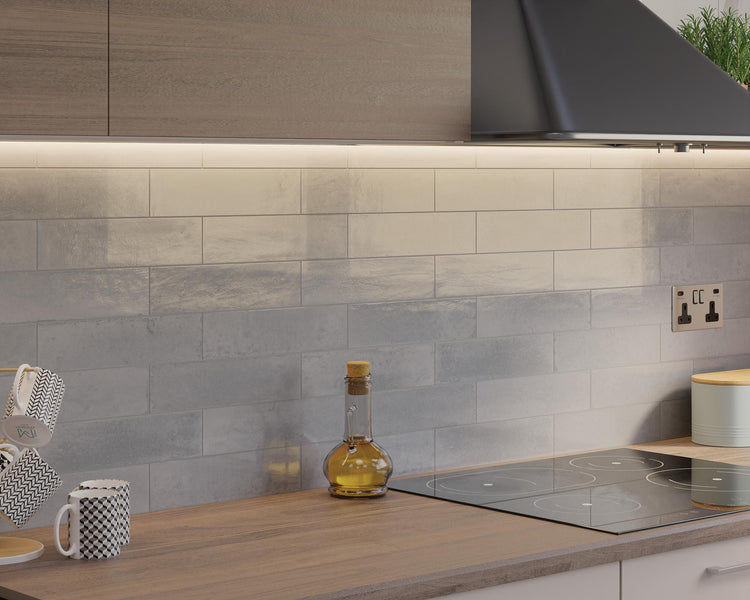 Stone-inspired Agadir Piedra tile in 3x11 glossy format, offering modern texture and shine.