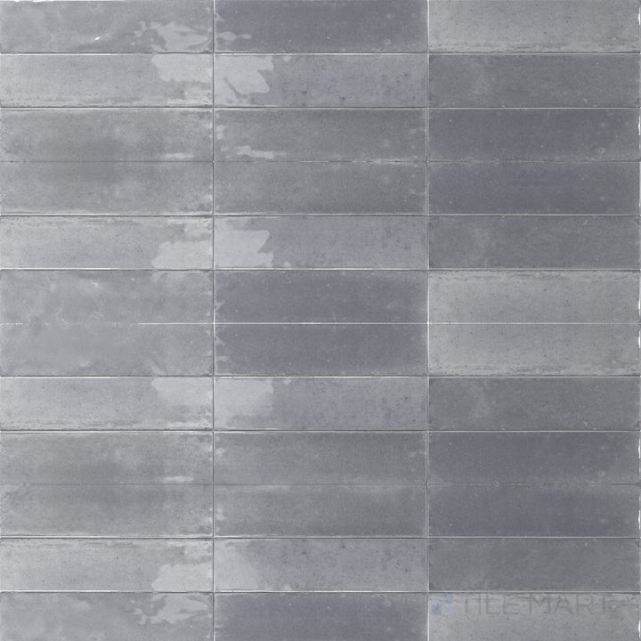 Stone-inspired neutrals and a reflective finish highlight the natural character of this 3x11 Agadir Piedra tile.