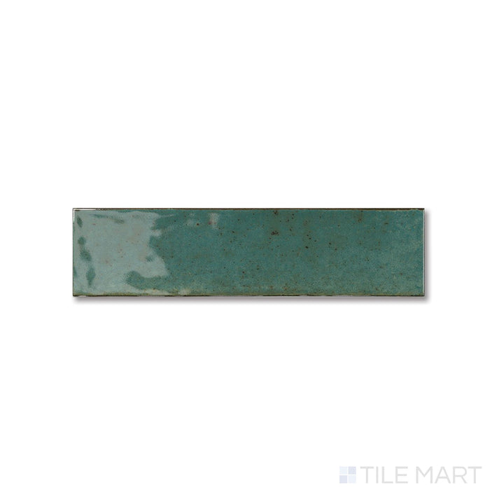 Flat view of Agadir Selva tile revealing its rich green gloss and sleek, narrow 3x11 layout.