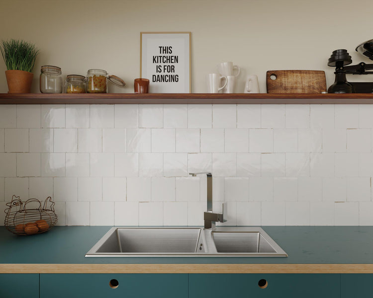 Agadir Niebla 6x6 glossy porcelain tile in a misty grey tone, ideal for soft, contemporary interiors.