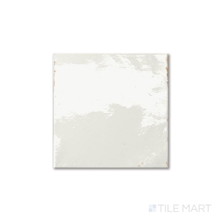 Top-down image of Agadir Niebla 6x6 tile showing soft gray tones with a luminous bright finish.
