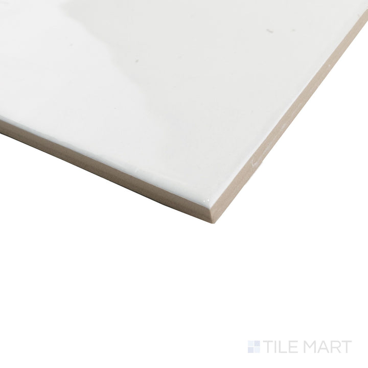 Corner detail of Agadir Niebla 6x6 tile featuring a light gray glossy finish with sharp tile edges and smooth surface.