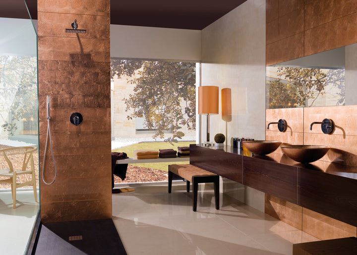 Cristal Foglio Di Rame 10x30 glossy glass tile with warm copper tones, ideal for bold and elegant accents.