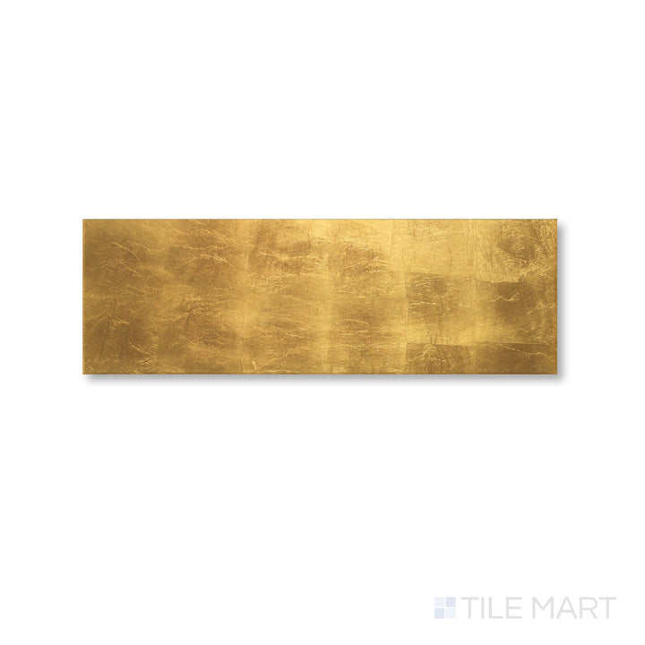 Flat lay of Cristal Foglio D'Oro 10x30 tile featuring rich gold tones and a sleek, high-gloss glass surface.