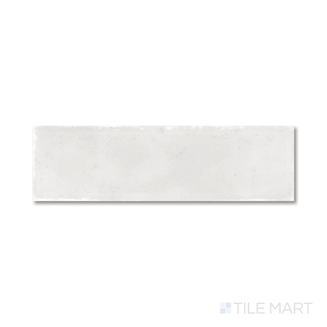 Overhead image of Milano Gesso 3x9 tile highlighting its chalky white matte finish and slim rectangular shape.