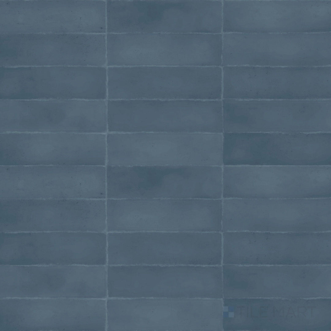 Deep blue color and a refined matte finish enhance the richness of this 3x9 Milano Blu porcelain tile.