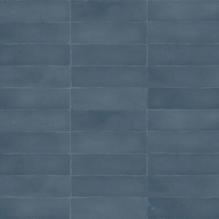 Deep blue color and a refined matte finish enhance the richness of this 3x9 Milano Blu porcelain tile.