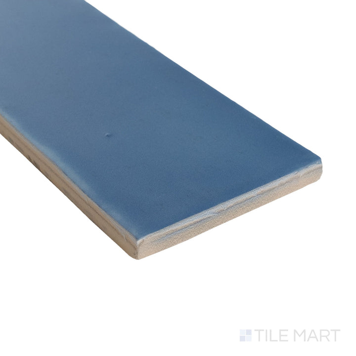 Corner detail of Milano Blu 3x9 tile with a deep navy matte finish and clean, rectangular edge.