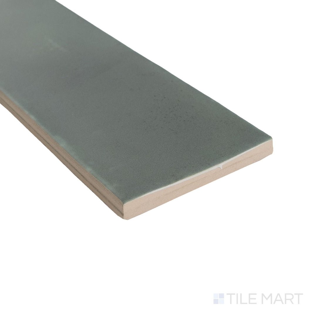 Close-up corner shot of Milano Bosco 3x9 tile highlighting earthy green-brown hues and a smooth edge finish.