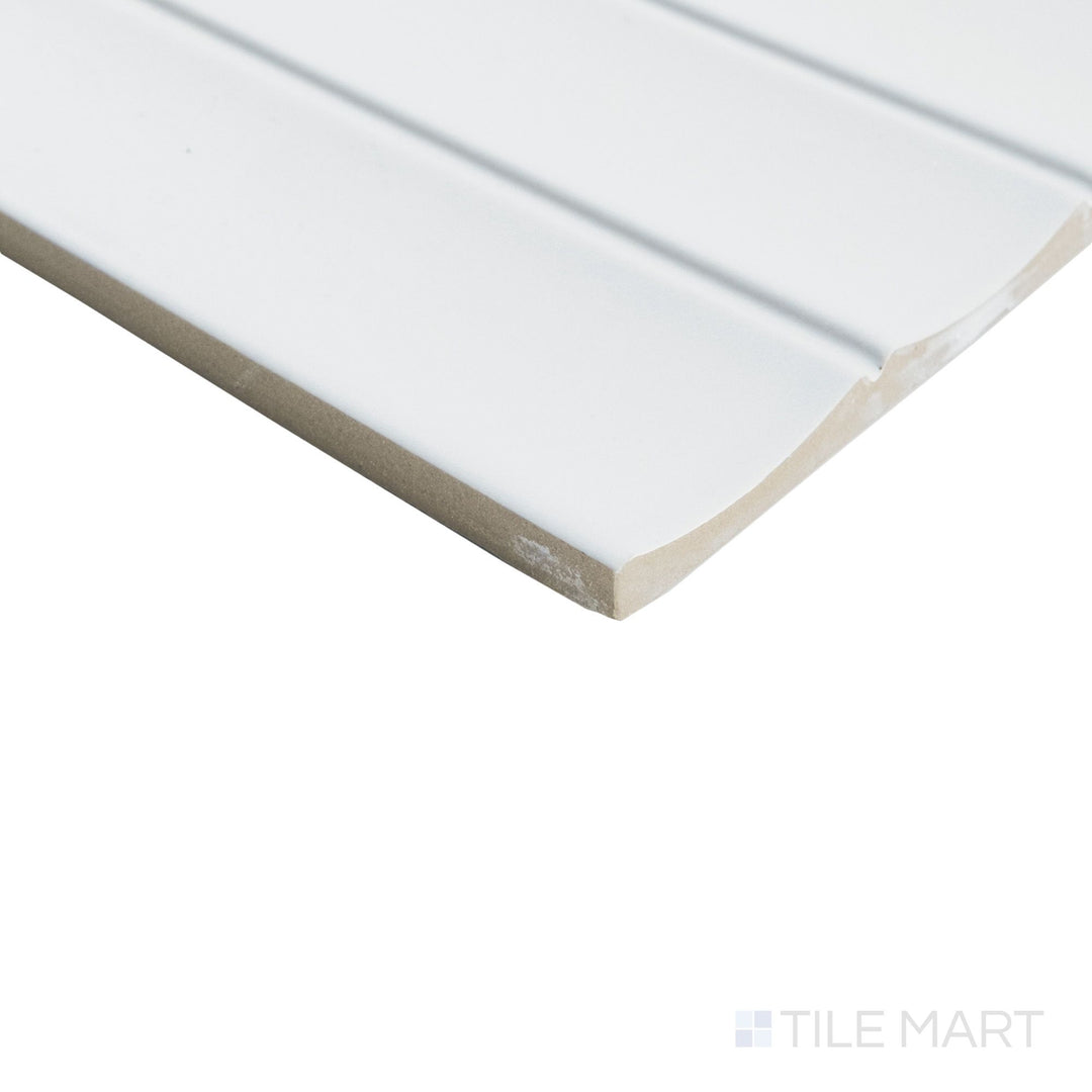 Corner view of Milano Scala Gesso 4.5x9 tile showing a subtle chalky texture and refined sculpted edge.