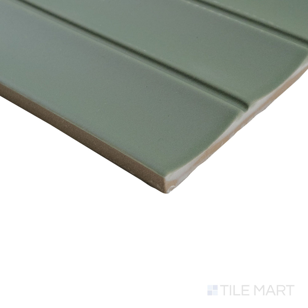 Close-up corner view of Milano Scala Bosco 4.5x9 tile highlighting its deep natural hue and polished tile edge.