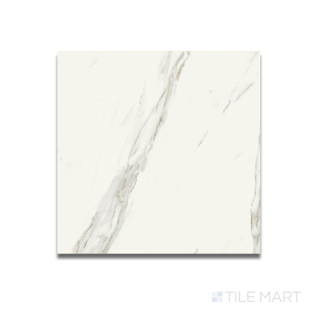 Top-down view of Calacatta Lux Superwhite 24x24 satin porcelain tile showcasing soft veining on a smooth, low-sheen white surface.