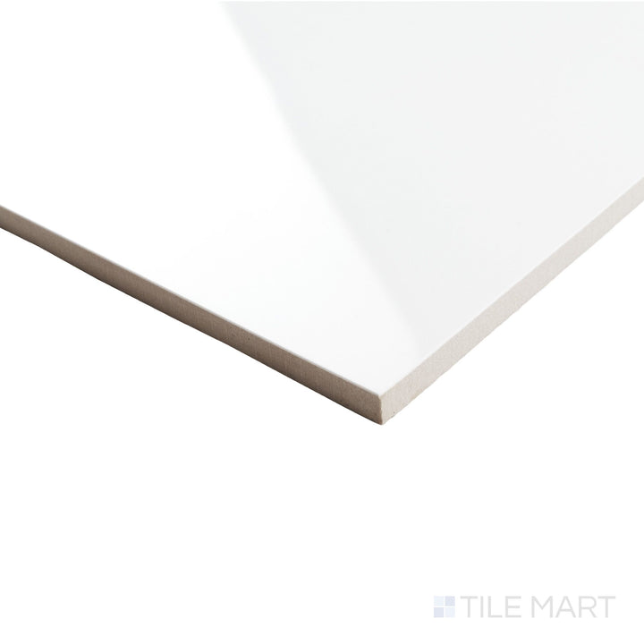 Corner perspective of Calacatta Lux Superwhite 35x35 tile with dramatic veining and a mirror-like polished finish across the edge.