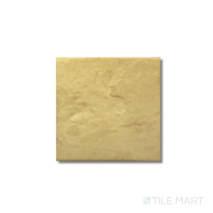 Flat lay of Golden Stone Anti-Slip 6x6 tile showing a matte surface texture with golden earth tones.