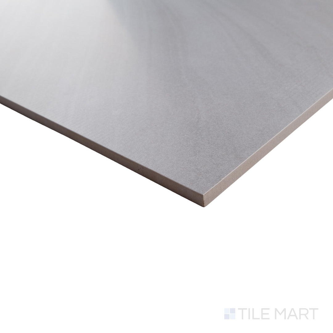 Corner perspective of Pietrasanta Light Grey 35x35 polished tile with elegant veining and a glossy surface along the edge.