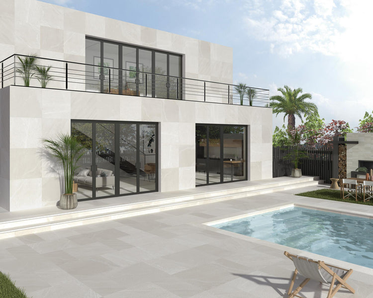 Polished Pietrasanta Ivory porcelain tile in a lifestyle setting, highlighting its glossy finish and luxurious light-toned surface.