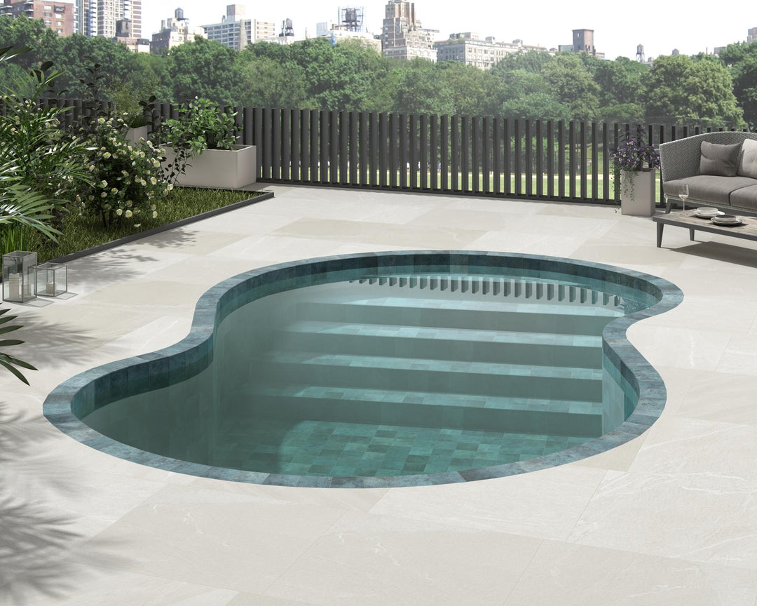 Modern room with Pietrasanta Ivory 35x35 anti-slip tile, showcasing its soft matte finish and natural stone-like texture.